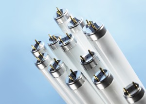 New fluorescent light tubes on blue background